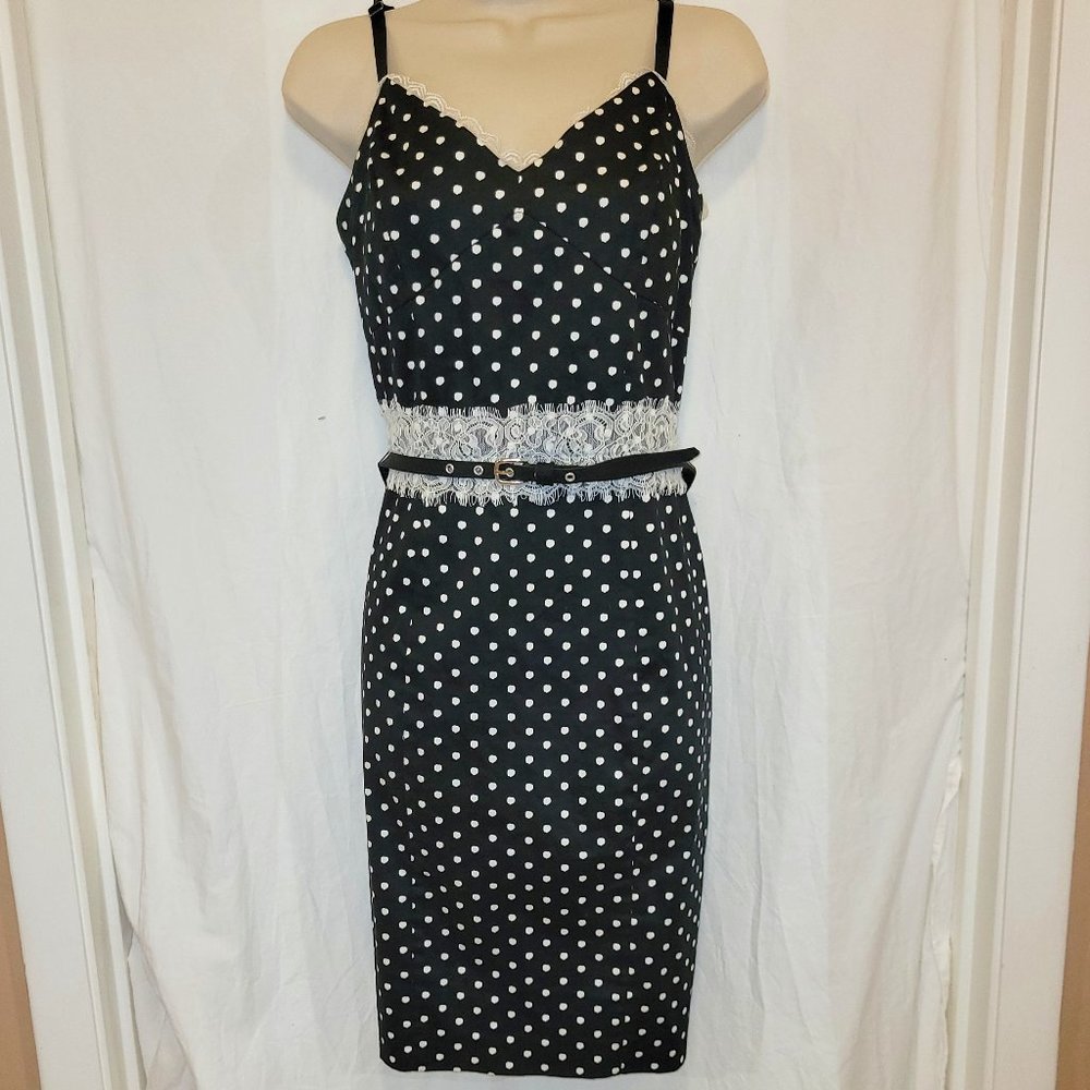 Black and white polka dot spaghetti strap  dress with belt.